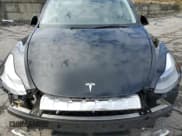 ✅ 2024 Tesla Model Y Long Range • VIN: 7SAYGDEE1RA226931 • Lot: 84868285. Listed on Copart with Not provided. Free auction sales archive from the USA and detailed vehicle history report at DreamBid. Image 11.