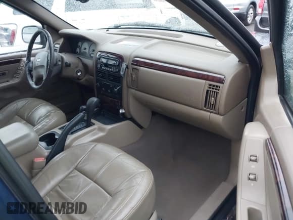 ✅ 2001 Jeep Grand Cherokee Limited • VIN: 1J4GW58N81C675678 • Lot: 43785500. Listed on IAAI with 201,792 mi. Free auction sales archive from the USA and detailed vehicle history report at DreamBid. Image 5.