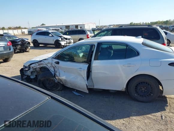 ✅ 2021 Toyota Camry Hybrid LE • VIN: 4T1H31AK3MU566826 • Лот: 43437913. Опубликован ранее на IAAI с пробегом 70 798 миль. Бесплатный доступ к архиву аукционных продаж из США и подробный отчёт об истории автомобиля на DreamBid. Изображение 14.