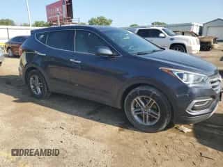 2018 Hyundai Santa Fe 2.4L z VIN 5NMZTDLB9JH095100, wystawiony jako Copart lot #64850795 z przebiegiem 92 794 mil mil oraz Szkoda całkowita • Salvage title. Historia ofert i sprzedaży dostępna na DreamBid. Obrazek 4.