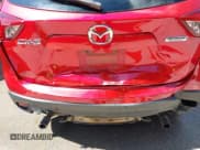 ✅ 2015 Mazda CX-5 Touring • VIN: JM3KE2CY2F0510101 • Lot: 43273950. Listed on IAAI with 128,283 mi. Free auction sales archive from the USA and detailed vehicle history report at DreamBid. Image 6.