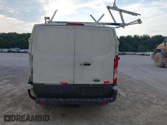 ✅ 2016 Ford Transit Cargo • VIN: 1FTYR1YM1GKB55158 • Lot: 42721028. Listed on IAAI with 86,169 mi. Free auction sales archive from the USA and detailed vehicle history report at DreamBid. Image 16.