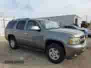 2007 Chevrolet Tahoe LS z VIN 1GNEC13J27J127383, wystawiony jako Copart lot #84521875 z przebiegiem 246 578 mil mil oraz Szkoda całkowita • Salvage title. Historia ofert i sprzedaży dostępna na DreamBid. Obrazek 4.