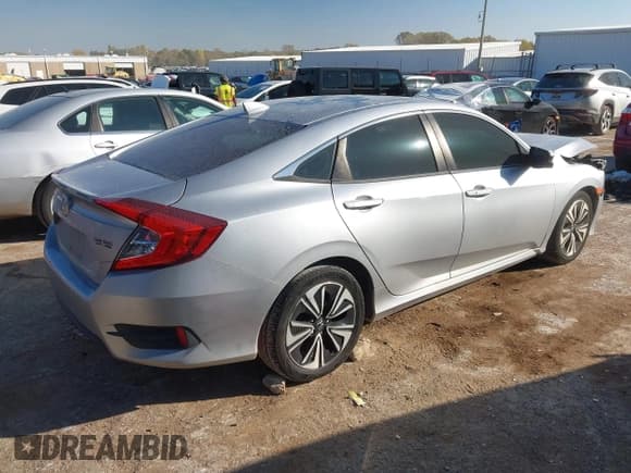 ✅ 2017 Honda Civic EX-T • VIN: 19XFC1F30HE005016 • Lot: 43641188. Listed on IAAI with 124,195 mi. Free auction sales archive from the USA and detailed vehicle history report at DreamBid. Image 4.