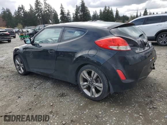 2013 Hyundai Veloster w/Gray Int z VIN KMHTC6AD5DU111338, wystawiony jako Copart lot #51661435 z przebiegiem 55 560 mil mil oraz Szkoda całkowita • Salvage title. Historia ofert i sprzedaży dostępna na DreamBid. Obrazek 2.