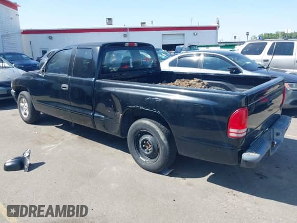 2002 Dodge Dakota Sport z VIN 1B7GL32X52S618892, wystawiony jako IAAI lot #42599446 z przebiegiem 161 214 mil mil oraz . Historia ofert i sprzedaży dostępna na DreamBid. Obrazek 3.