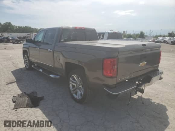 2014 Chevrolet Silverado 1500 LTZ with VIN 3GCUKSEC2EG128866, listed as a Copart auction lot 67001695 with 186,402 mi miles and Salvage title. Bid and sale history available at DreamBid. Image 2.