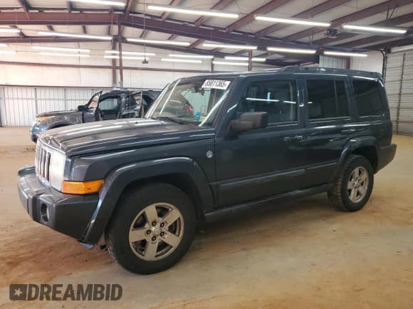 ✅ 2007 Jeep Commander Sport • VIN: 1J8HG48P57C683810 • Lot: 85811365. Listed on Copart with 199,026 mi. Free auction sales archive from the USA and detailed vehicle history report at DreamBid. Image 1.