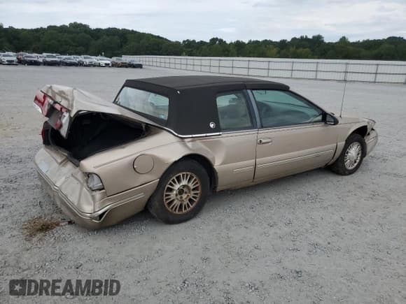 ✅ 1997 Mercury Cougar • VIN: 1MELM6245VH603795 • Лот: 70293355. Опубликован ранее на Copart с пробегом 99 536 миль. Бесплатный доступ к архиву аукционных продаж из США и подробный отчёт об истории автомобиля на DreamBid. Изображение 3.