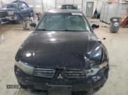 ✅ 2002 Mitsubishi Galant ES • VIN: 4A3AA46G32E114106 • Lot: 64320224. Wystawiony na Copart z przebiegiem 119 403 mil. Bezpłatny archiwum sprzedaży aukcyjnych z USA i szczegółowy raport historii pojazdu na DreamBid. Zdjęcie 5.