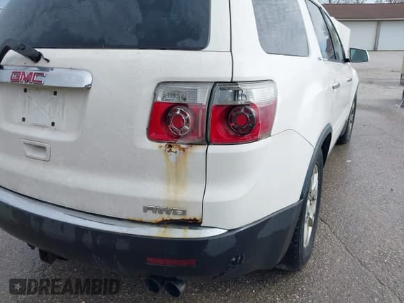 ✅ 2009 GMC Acadia SLT1 • VIN: 1GKEV23D99J204065 • Lot: 43578638. Listed on IAAI with 205,955 mi. Free auction sales archive from the USA and detailed vehicle history report at DreamBid. Image 6.