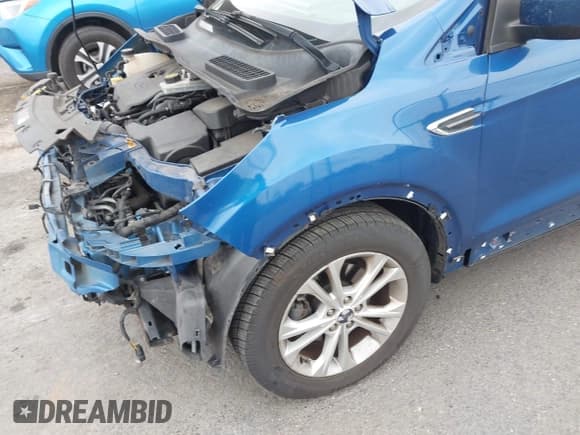 ✅ 2017 Ford Escape SE • VIN: 1FMCU0GD5HUA58227 • Lot: 43776457. Listed on IAAI with 104,921 mi. Free auction sales archive from the USA and detailed vehicle history report at DreamBid. Image 6.