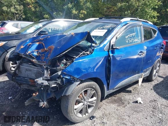 2014 Hyundai Tucson Limited with VIN KM8JUCAG1EU923895, listed as a IAAI auction lot 43296605 with 259,486 mi miles and . Bid and sale history available at DreamBid. Image 17.