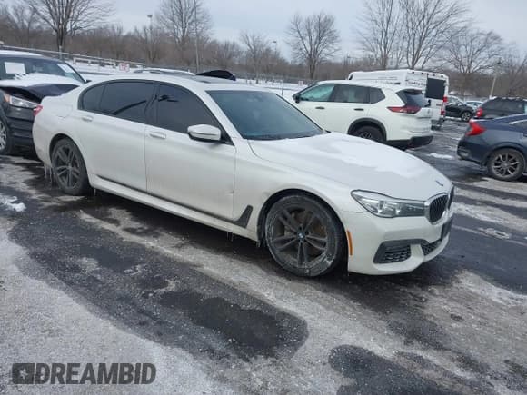 ✅ 2018 BMW 7 Series 740i xDrive • VIN: WBA7E4C59JGV23876 • Lot: 41381398. Listed on IAAI with 106,675 mi. Free auction sales archive from the USA and detailed vehicle history report at DreamBid. Image 1.