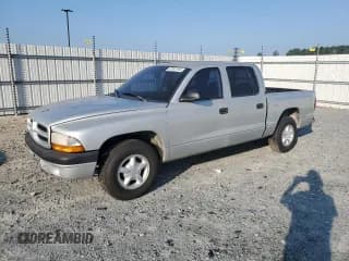 ✅ 2002 Dodge Dakota Sport • VIN: 1B7HL38X32S504501 • Lot: 67901164. Wystawiony na Copart z przebiegiem 270 434 mil. Bezpłatny archiwum sprzedaży aukcyjnych z USA i szczegółowy raport historii pojazdu na DreamBid. Zdjęcie 1.