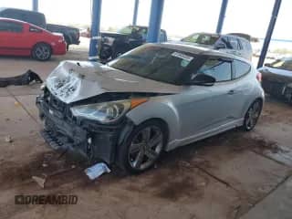 2013 Hyundai Veloster Turbo с VIN KMHTC6AE7DU145337, выставлен на аукционе Copart как лот 61585335 с пробегом 97 892 миль миль и Списание • Salvage title. История ставок и продаж доступна на DreamBid. Изображение 1.