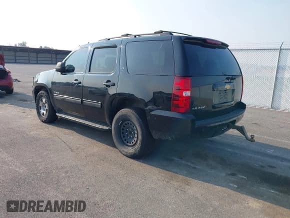 ✅ 2014 Chevrolet Tahoe LT • VIN: 1GNSCBE01ER235571 • Lot: 42403118. Listed on IAAI with 238,069 mi. Free auction sales archive from the USA and detailed vehicle history report at DreamBid. Image 3.
