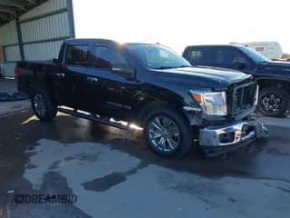 ✅ 2018 Nissan Titan Pro-4X • VIN: 1N6AA1E52JN511884 • Lot: 43594095. Listed on IAAI with 122,006 mi. Free auction sales archive from the USA and detailed vehicle history report at DreamBid. Image 1.