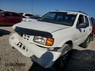 ✅ 1999 Isuzu Rodeo S • VIN: 4S2CM58W0X4306727 • Lot: 74758994. Wystawiony na Copart z przebiegiem 193 850 mil. Bezpłatny archiwum sprzedaży aukcyjnych z USA i szczegółowy raport historii pojazdu na DreamBid. Zdjęcie 1.