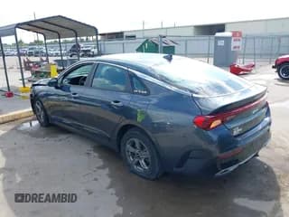 ✅ 2023 Kia K5 LXS • VIN: 5XXG14J28PG185894 • Лот: 43234470. Опубликован ранее на IAAI с пробегом 81 449 миль. Бесплатный доступ к архиву аукционных продаж из США и подробный отчёт об истории автомобиля на DreamBid. Изображение 3.