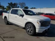 ✅ 2023 Ford F-150 Lightning Lariat • VIN: 1FTVW1EV0PWG12849 • Lot: 87083755. Listed on Copart with 35,557 mi. Free auction sales archive from the USA and detailed vehicle history report at DreamBid. Image 4.