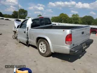 2003 Dodge Dakota z VIN 1D7FL16X93S301215, wystawiony jako Copart lot #68710654 z przebiegiem 272 870 mil mil oraz Czysty tytuł • Clean title. Historia ofert i sprzedaży dostępna na DreamBid. Obrazek 2.