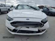 ✅ 2017 Ford Fusion Hybrid SE • VIN: 3FA6P0LU8HR172198 • Lot: 91813455. Wystawiony na Copart z przebiegiem 180 468 mil. Bezpłatny archiwum sprzedaży aukcyjnych z USA i szczegółowy raport historii pojazdu na DreamBid. Zdjęcie 5.