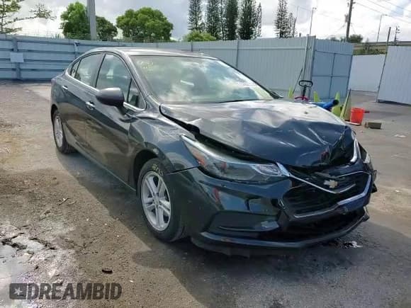 ✅ 2018 Chevrolet Cruze LT • VIN: 1G1BE5SM9J7151525 • Lot: 57808323. Listed on Copart with 101,077 mi. Free auction sales archive from the USA and detailed vehicle history report at DreamBid. Image 11.