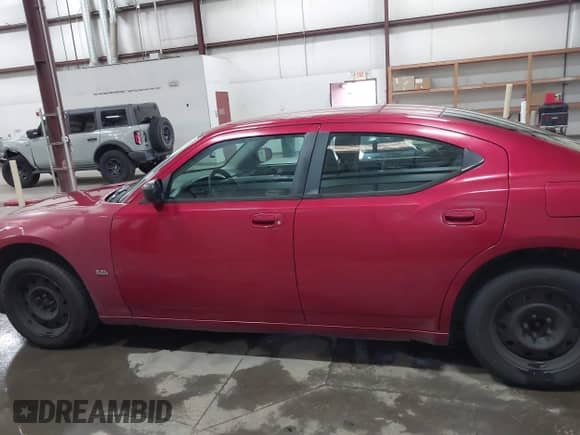 2006 Dodge Charger z VIN 2B3KA43G86H251859, wystawiony jako IAAI lot #43544502 z przebiegiem 110 548 mil mil oraz . Historia ofert i sprzedaży dostępna na DreamBid. Obrazek 15.