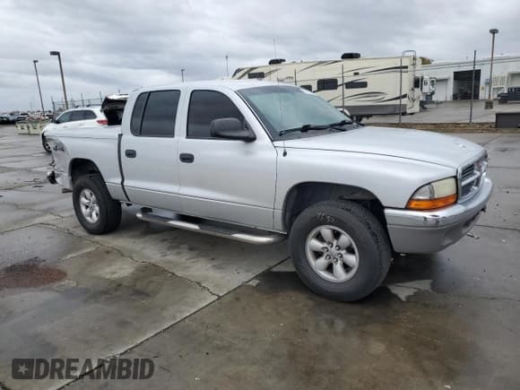 ✅ 2004 Dodge Dakota SLT • VIN: 1D7HG48N34S774345 • Lot: 82226034. Wystawiony na Copart z przebiegiem 177 733 mil. Bezpłatny archiwum sprzedaży aukcyjnych z USA i szczegółowy raport historii pojazdu na DreamBid. Zdjęcie 4.