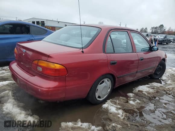 ✅ 2002 Chevrolet Prizm • VIN: 1Y1SK52852Z403372 • Lot: 45116165. Listed on Copart with 96,212 mi. Free auction sales archive from the USA and detailed vehicle history report at DreamBid. Image 3.