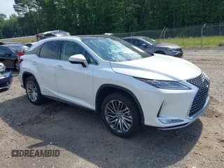 ✅ 2022 Lexus RX 450h • VIN: 2T2JGMDA7NC085504 • Lot: 42201846. Listed on IAAI with 47,659 mi. Free auction sales archive from the USA and detailed vehicle history report at DreamBid. Image 1.