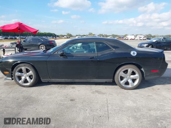 ✅ 2013 Dodge Challenger R/T • VIN: 2C3CDYBT8DH500842 • Lot: 41454915. Wystawiony na IAAI z przebiegiem 66 055 mil. Bezpłatny archiwum sprzedaży aukcyjnych z USA i szczegółowy raport historii pojazdu na DreamBid. Zdjęcie 14.