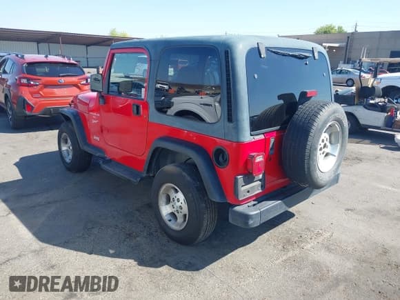 ✅ 1999 Jeep Wrangler Sport • VIN: 1J4FY19S2XP489428 • Лот: 43210167. Опубликован ранее на IAAI с пробегом 185 950 миль. Бесплатный доступ к архиву аукционных продаж из США и подробный отчёт об истории автомобиля на DreamBid. Изображение 3.