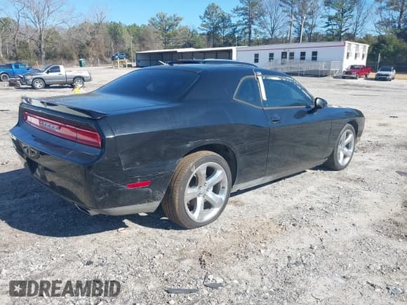 ✅ 2014 Dodge Challenger SXT • VIN: 2C3CDYAG1EH229824 • Lot: 41749410. Listed on IAAI with 103,079 mi. Free auction sales archive from the USA and detailed vehicle history report at DreamBid. Image 4.