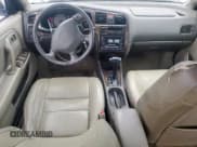 ✅ 1999 Infiniti G20 • VIN: JNKCP11A8XT014502 • Lot: 60660505. Wystawiony na Copart z przebiegiem 342 650 mil. Bezpłatny archiwum sprzedaży aukcyjnych z USA i szczegółowy raport historii pojazdu na DreamBid. Zdjęcie 8.