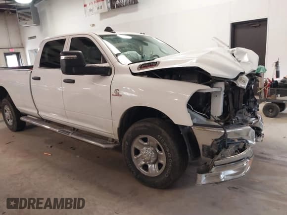 ✅ 2023 Ram 2500 Tradesman • VIN: 3C6UR5HL0PG529660 • Lot: 41491722. Listed on IAAI with 43,672 mi. Free auction sales archive from the USA and detailed vehicle history report at DreamBid. Image 1.