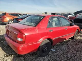 ✅ 2000 Mazda Protege DX • VIN: JM1BJ2225Y0309023 • Lot: 85962334. Wystawiony na Copart z przebiegiem 237 922 mil. Bezpłatny archiwum sprzedaży aukcyjnych z USA i szczegółowy raport historii pojazdu na DreamBid. Zdjęcie 3.