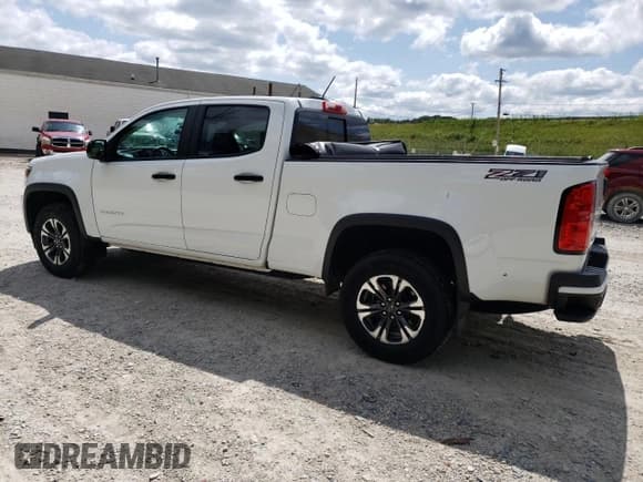 ✅ 2022 Chevrolet Colorado 4WD Z71 • VIN: 1GCGTDEN2N1280894 • Лот: 68010564. Опубликован ранее на Copart с пробегом 22 517 миль. Бесплатный доступ к архиву аукционных продаж из США и подробный отчёт об истории автомобиля на DreamBid. Изображение 2.