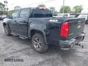 ✅ 2015 Chevrolet Colorado 4WD Z71 • VIN: 1GCGTCE35F1142339 • Лот: 43211081. Опубликован ранее на IAAI с пробегом 132 862 миль. Бесплатный доступ к архиву аукционных продаж из США и подробный отчёт об истории автомобиля на DreamBid. Изображение 3.
