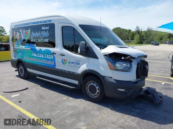 ✅ 2021 Ford Transit Passenger XL • VIN: 1FBAX2C80MKA71307 • Lot: 42790699. Listed on IAAI with 67,943 mi. Free auction sales archive from the USA and detailed vehicle history report at DreamBid. Image 1.