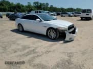 ✅ 2013 Jaguar XJ • VIN: SAJWA1C7XD8V55164 • Лот: 80382115. Опубликован ранее на Copart с пробегом 69 465 миль. Бесплатный доступ к архиву аукционных продаж из США и подробный отчёт об истории автомобиля на DreamBid. Изображение 14.