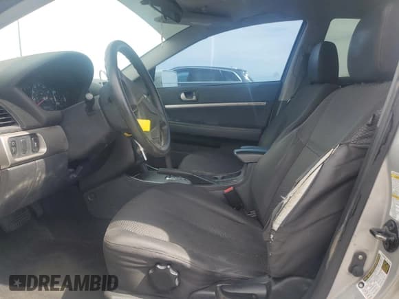 ✅ 2012 Mitsubishi Galant FE • VIN: 4A32B2FFXCE016690 • Lot: 48818385. Listed on Copart with 201,891 mi. Free auction sales archive from the USA and detailed vehicle history report at DreamBid. Image 7.