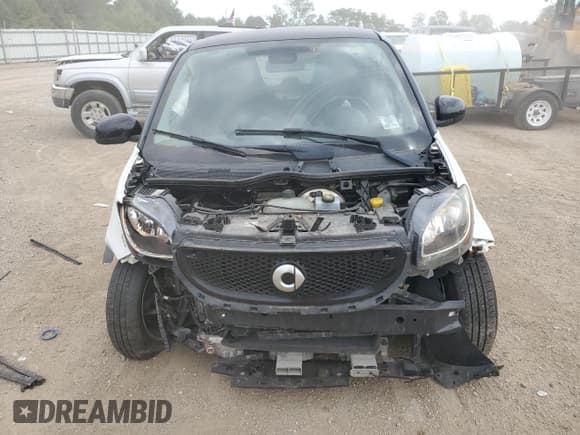 ✅ 2016 Smart fortwo Prime • VIN: WMEFJ5DA4GK054621 • Lot: 68703105. Wystawiony na Copart z przebiegiem 70 845 mil. Bezpłatny archiwum sprzedaży aukcyjnych z USA i szczegółowy raport historii pojazdu na DreamBid. Zdjęcie 5.