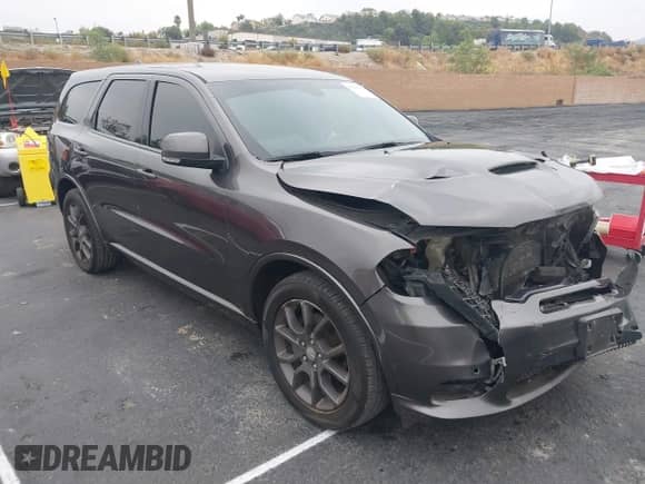 2018 Dodge Durango R/T with VIN 1C4SDHCT8JC100591, listed as a IAAI auction lot 43296025 with 95,326 mi miles and . Bid and sale history available at DreamBid. Image 1.