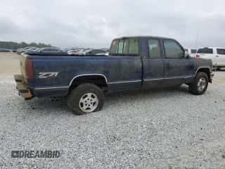 1993 Chevrolet Silverado 2500 z VIN 1GCFK29K4PE247281, wystawiony jako Copart lot #55082295 z przebiegiem 375 762 mil mil oraz Czysty tytuł • Clean title. Historia ofert i sprzedaży dostępna na DreamBid. Obrazek 3.