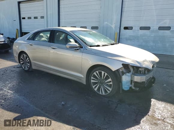 ✅ 2017 Lincoln MKZ Select • VIN: 3LN6L5C99HR647836 • Lot: 92016375. Wystawiony na Copart z przebiegiem 97 729 mil. Bezpłatny archiwum sprzedaży aukcyjnych z USA i szczegółowy raport historii pojazdu na DreamBid. Zdjęcie 4.