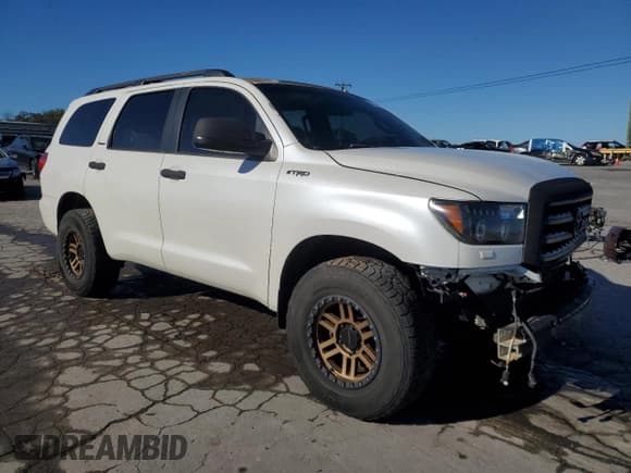 ✅ 2012 Toyota Sequoia Platinum • VIN: 5TDDW5G14CS062207 • Lot: 85547175. Listed on Copart with 171,208 mi. Free auction sales archive from the USA and detailed vehicle history report at DreamBid. Image 4.