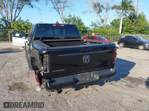 ✅ 2021 Ram 1500 Laramie • VIN: 1C6RREJT5MN544075 • Lot: 43603819. Listed on IAAI with 88,025 mi. Free auction sales archive from the USA and detailed vehicle history report at DreamBid. Image 6.