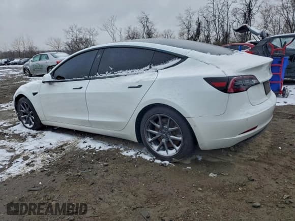 ✅ 2021 Tesla Model 3 Standard Range Plus • VIN: 5YJ3E1EA2MF919799 • Лот: 95458295. Опубликован ранее на Copart с пробегом 124 303 миль. Бесплатный доступ к архиву аукционных продаж из США и подробный отчёт об истории автомобиля на DreamBid. Изображение 2.